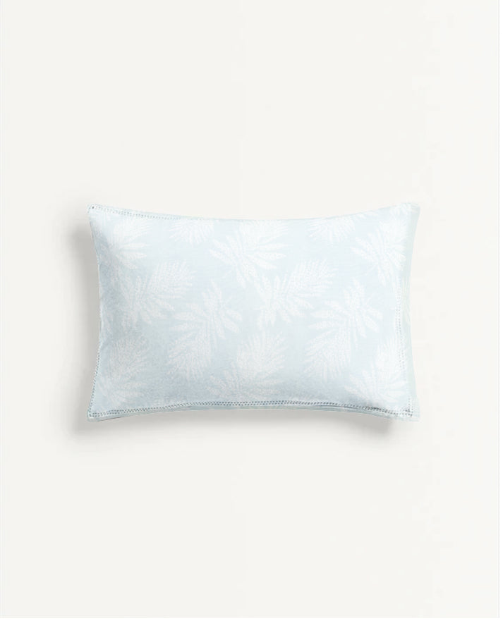 White pillow on a light gray background
