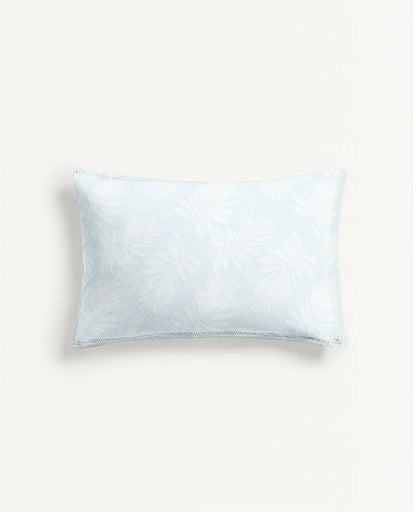 White pillow on a light gray background