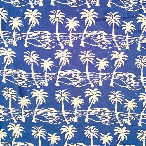 Pattern of white palm trees and mountains on a blue background