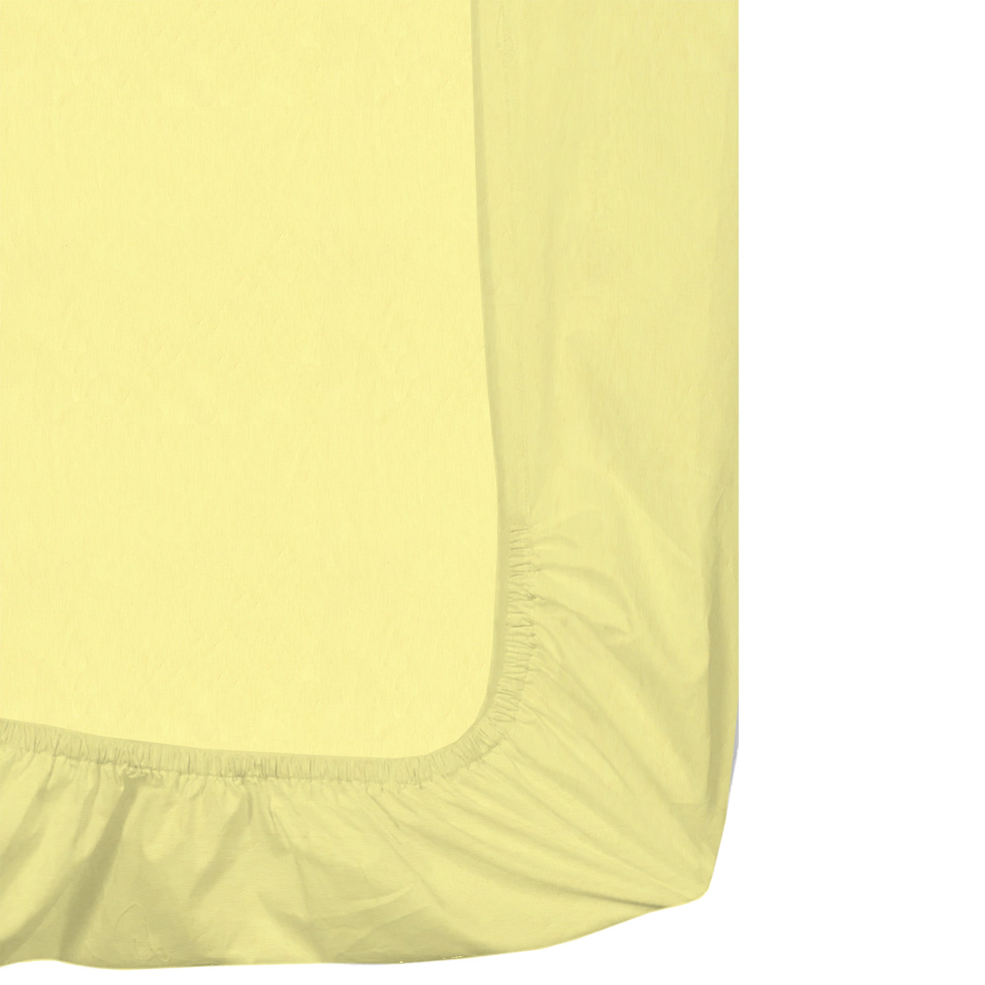 Yellow fitted sheet corner on a white background