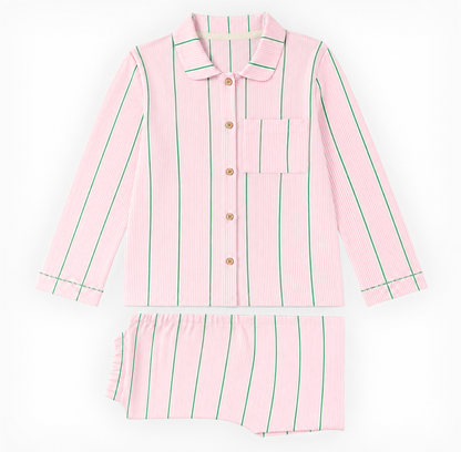 A two-piece girls' pajama set consisting of a long-sleeve button-front top and matching shorts, both in light pink with thin vertical green stripes, laid flat on a white background.