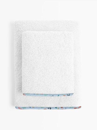 White towel with a colorful  sea garden  border on a white background