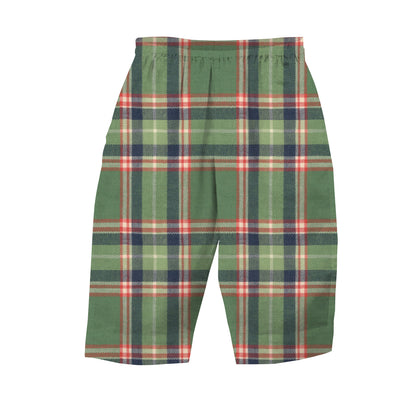 Green plaid shorts on a white background