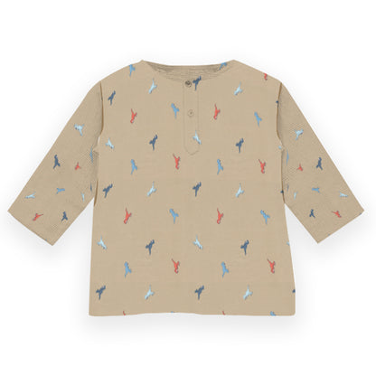 Beige long-sleeve shirt with colorful pattern on a white background