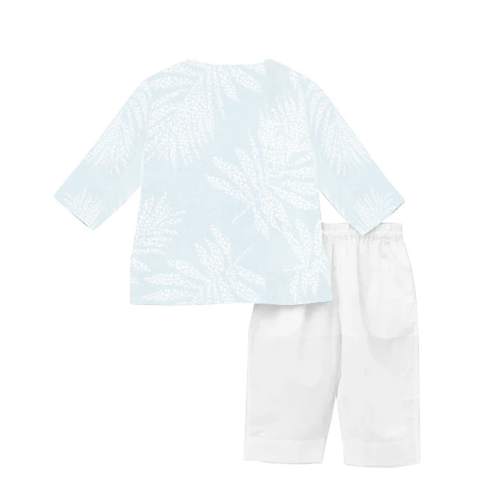 Light blue textured top and white pants on a white background