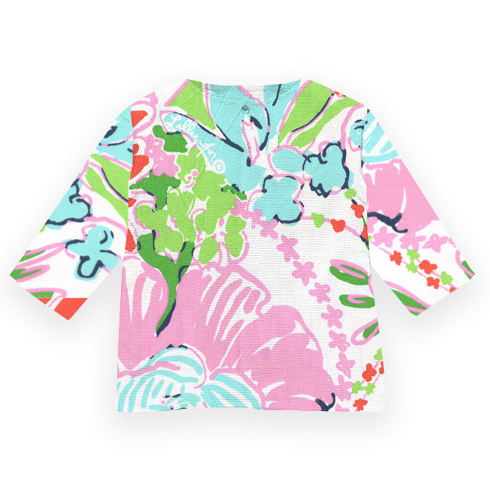 Colorful floral-patterned shirt on a white background